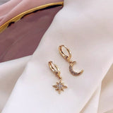 Boucles d'oreilles lune et étoile asymétriques