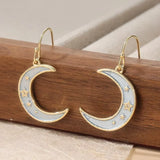 Boucles d'oreilles lune et étoile pendantes (doré)