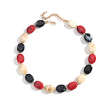 Collier ras du cou perles marbrées