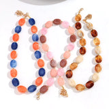 Collier ras du cou perles marbrées