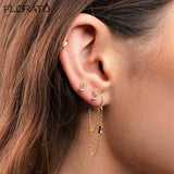 Boucle d'oreille lune à chaîne dorée