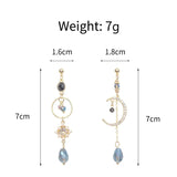 Boucles d'Oreilles Lune Asymétriques Cristal
