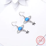 Boucles d'Oreilles Pendantes Planète couleur argent