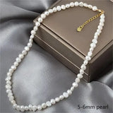 Collier ras du cou perles baroques blanches