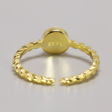 bague pierre de lune tressé en or