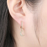 Boucle d'oreille demi lune dorée