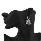 Boucle d'oreille lune et soleil ensemble