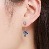 Boucles d'oreille lune avec étoiles bleutées