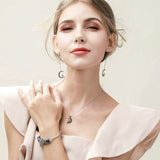 boucle d'oreille lune sorcière argent