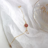 Bracelet lune avec perle rose