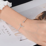 Bracelet croissant de lune étoilé