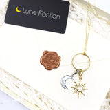 collier breloque lune et soleil or