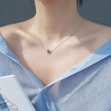 collier demi-lune avec étoile bleue scintillante