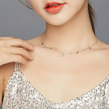 collier lune brillante avec étoiles