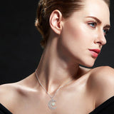 collier lune lumineux fluo