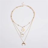collier lune aux trois rangs voyage