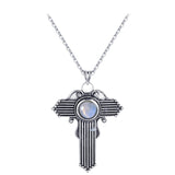 collier pierre de lune croix d'ange blanche
