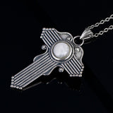 collier pierre de lune croix blanche