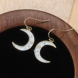 Boucles d'oreilles lune et étoile pendantes (doré)