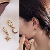 Boucles d'oreilles lune et étoile asymétriques (doré)