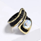 Bague cocktail goutte noir et or