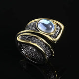 Bague cocktail goutte noir et or