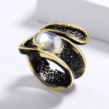 Bague cocktail goutte noir et or