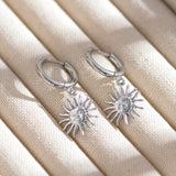 Boucle d'oreille pendante Soleil (Acier)