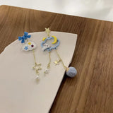 Boucles d'oreilles lune asymétriques pendantes