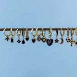 Boucles d'oreilles créoles lune et étoile noires