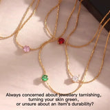 Collier pendentif zircon noir, acier doré