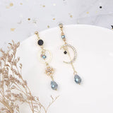 Boucles d'Oreilles Lune Asymétriques Cristal