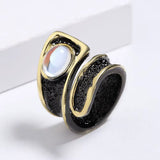 Bague cocktail goutte noir et or