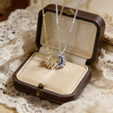 Collier Lune et Soleil en zircons (doré)