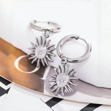 Boucle d'oreille pendante Soleil (Acier)